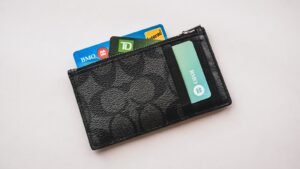 a wallet with credit cards sticking out of it